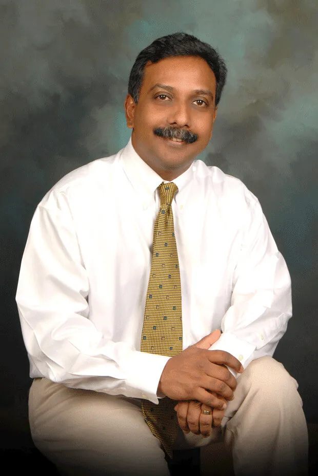Dr John Louis